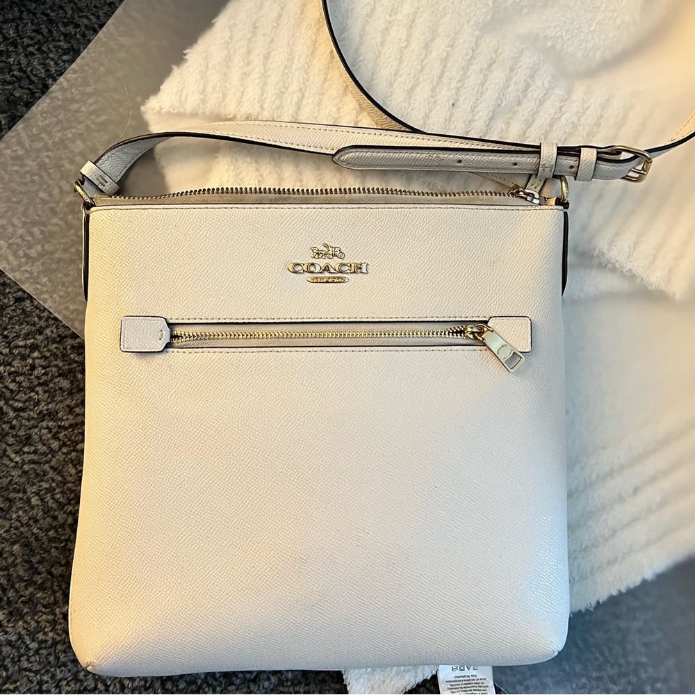 White and gold Coach crossbody purse